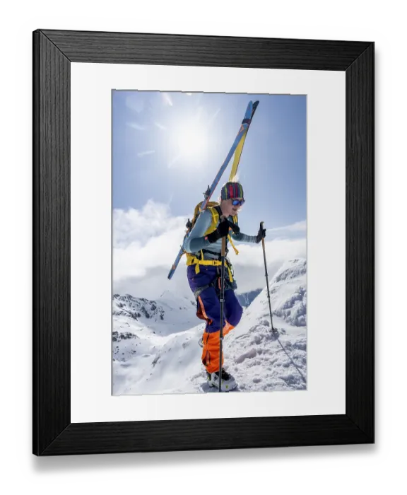 Framed Print : Mountaineer with skis at the fork Porta d'Es-cha