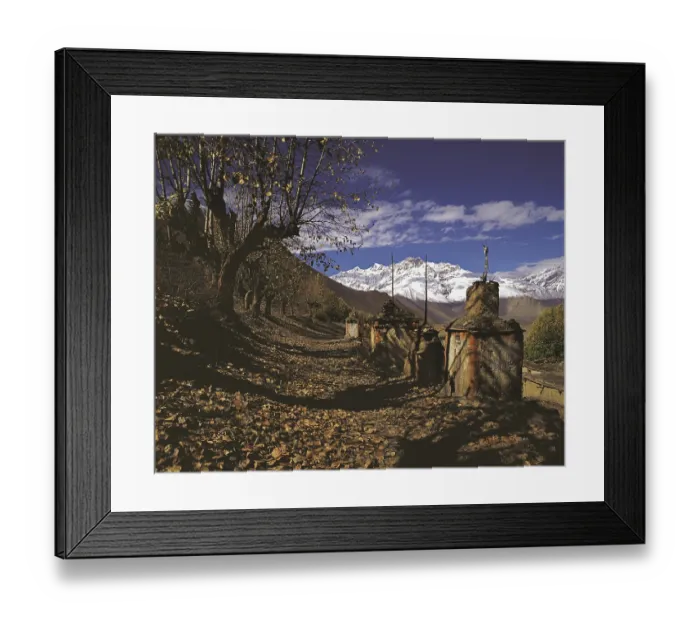 Framed Print : Row of ancient Buddhist devotional objects or chortens with the northern part of the Dhaulagiri Himal behind near Framed Print : Row of ancient Buddhist devotional objects or chortens with the northern part of the Dhaulagiri Himal behind near