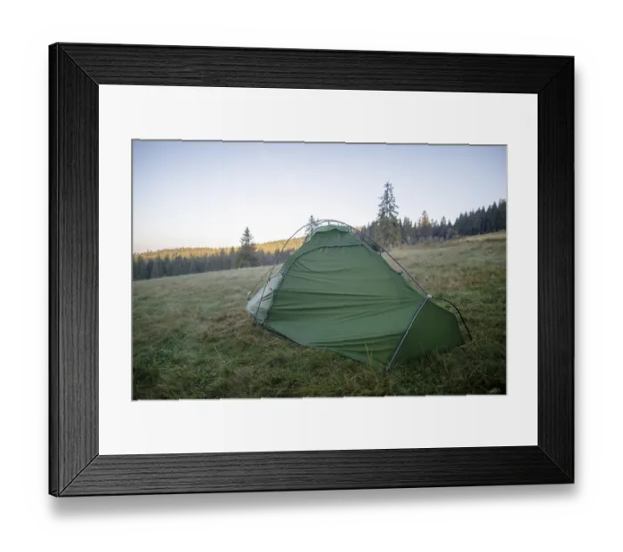 Framed Print : Green tent on a forest meadow in the morning light Framed Print : Green tent on a forest meadow in the morning light