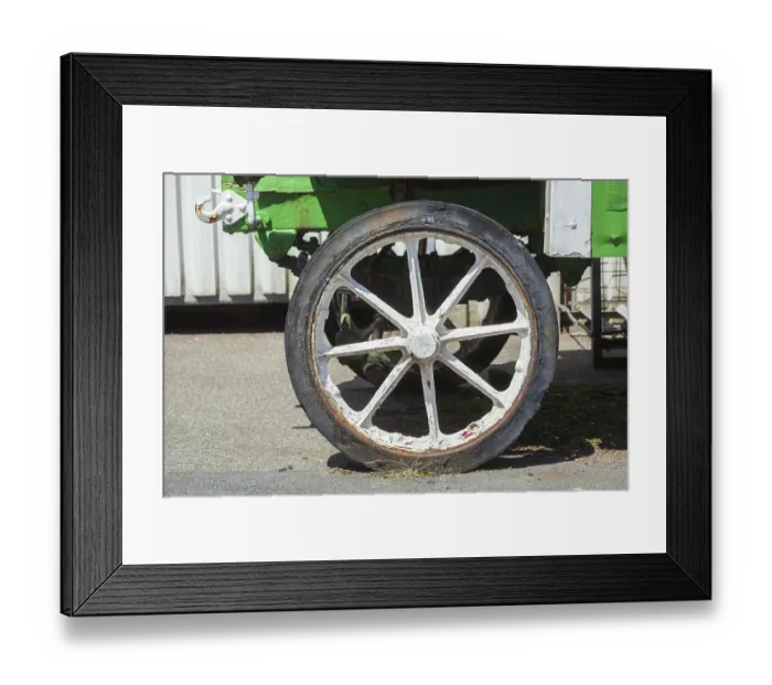 Framed Print : Tyre and wheel with spokes of a vintage car