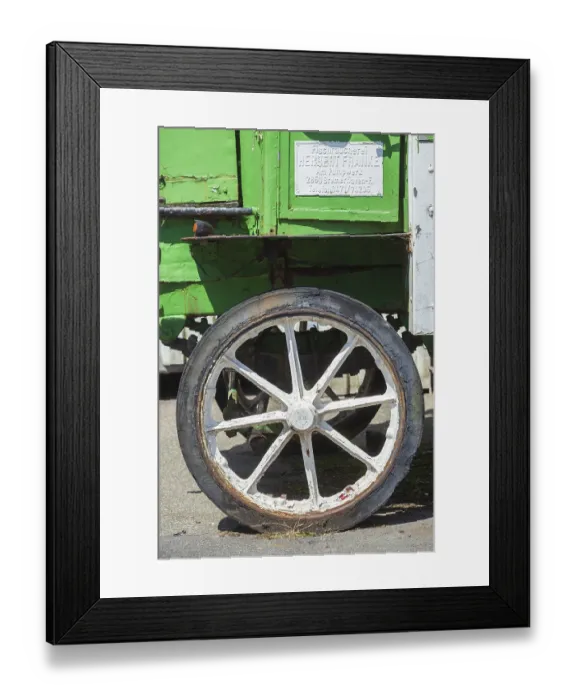 Framed Print : Tyre and wheel with spokes of a vintage car