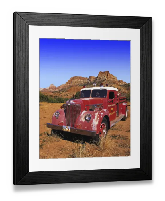 Framed Print : Old-style red fire engine parked on scrubland at the entrance to Zion Canyon