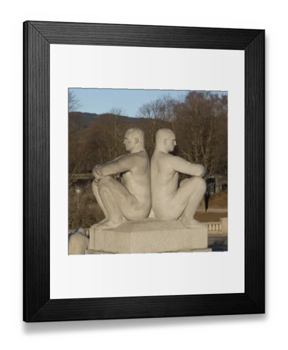 Framed Print : Granite sculpture, two men sitting back to back