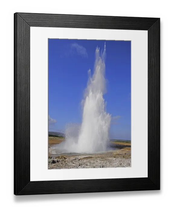 Framed Print : The geyser Strokkur fires steam and boiling water up to a height of around 20m
