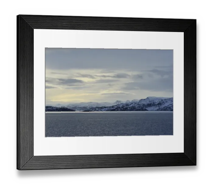 Framed Print : Rocky island landscape at the north sea with cloudy sky