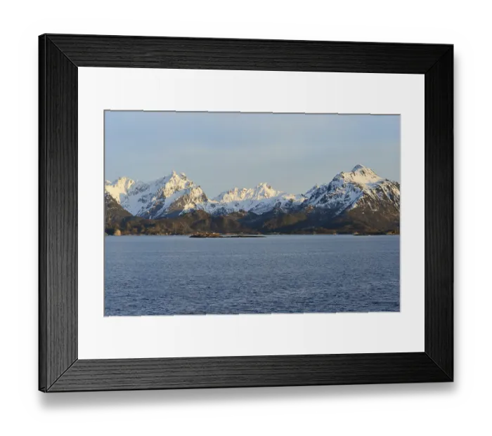 Framed Print : Snow-covered mountains on Hadselfjord in the evening light Framed Print : Snow-covered mountains on Hadselfjord in the evening light
