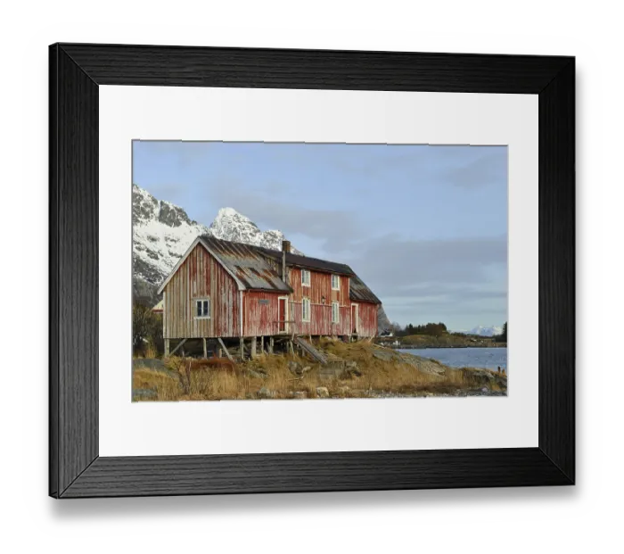 Framed Print : Old wooden house on the seashore