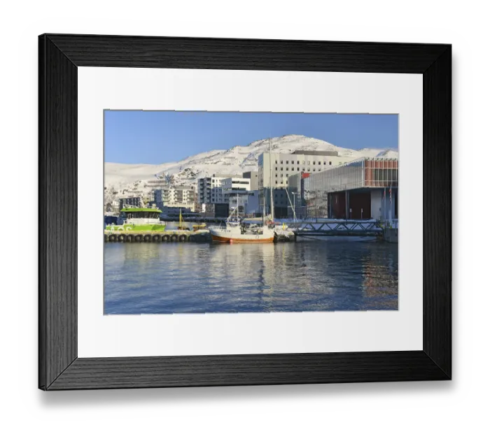 Framed Print : Boats and residential buildings on the shore of a bay Framed Print : Boats and residential buildings on the shore of a bay