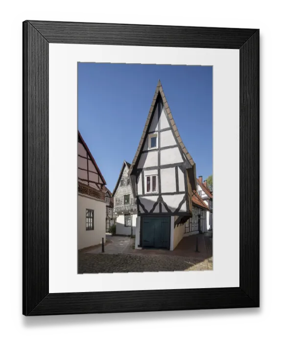 Framed Print : Minden, half-timbered house Windloch next to the Martini church Framed Print : Minden, half-timbered house Windloch next to the Martini church