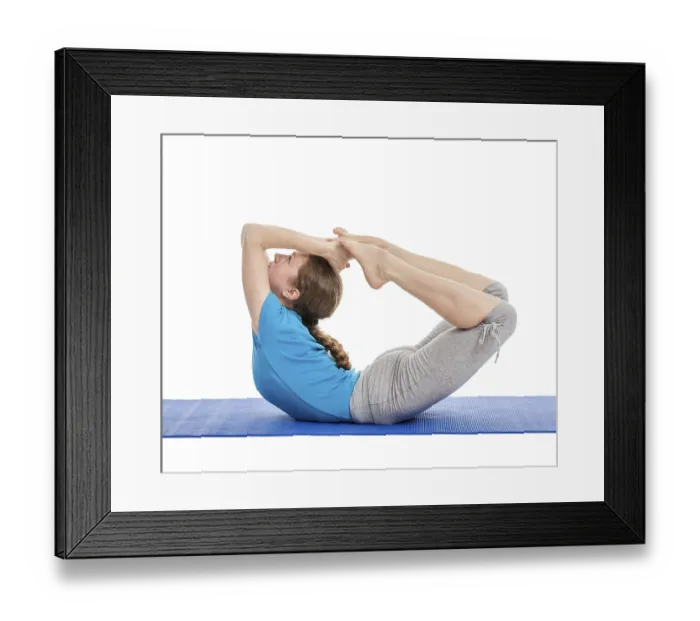 Framed Print : Yoga, young beautiful slender woman yoga instructor doing Bow pose (Balancing on abdomen in the shape of a bow) Framed Print : Yoga, young beautiful slender woman yoga instructor doing Bow pose (Balancing on abdomen in the shape of a bow)