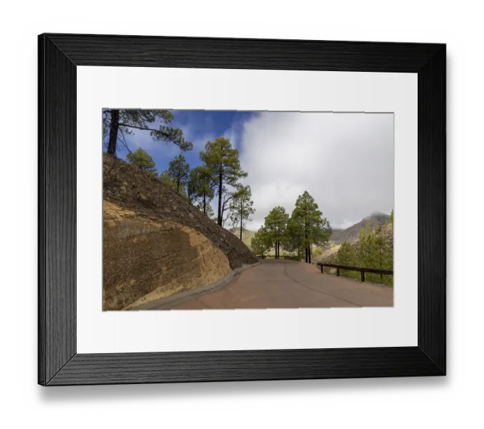 Framed Print : Geological outcrop, volcanic strata and grove of Canary Island pines
