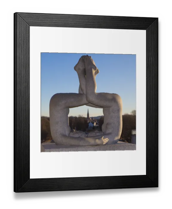 Framed Print : Granite sculpture, a man and a woman merging in an acrobatic pose Framed Print : Granite sculpture, a man and a woman merging in an acrobatic pose