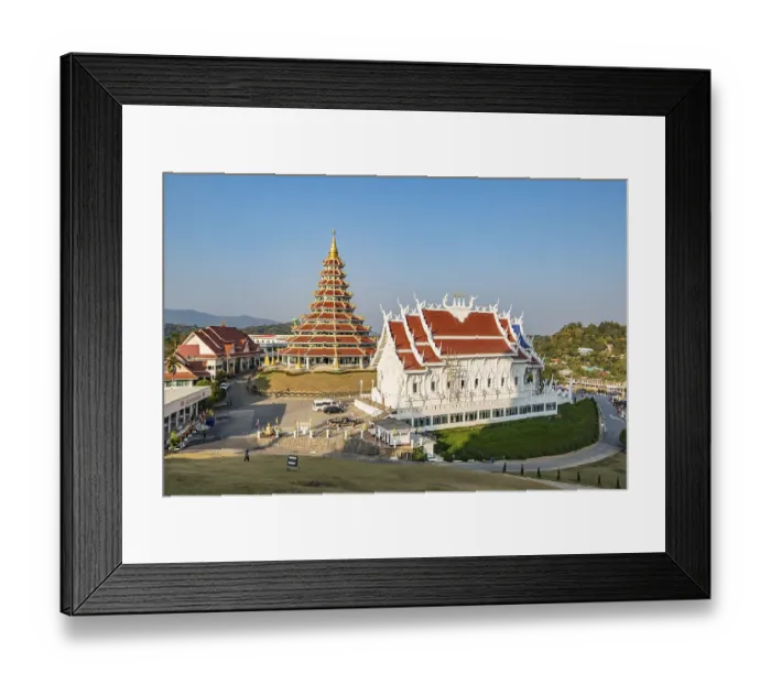 Framed Print : Nine tiered pagoda and viharn assembly hall at Wat Huay Pla Kang in Chiang Rai