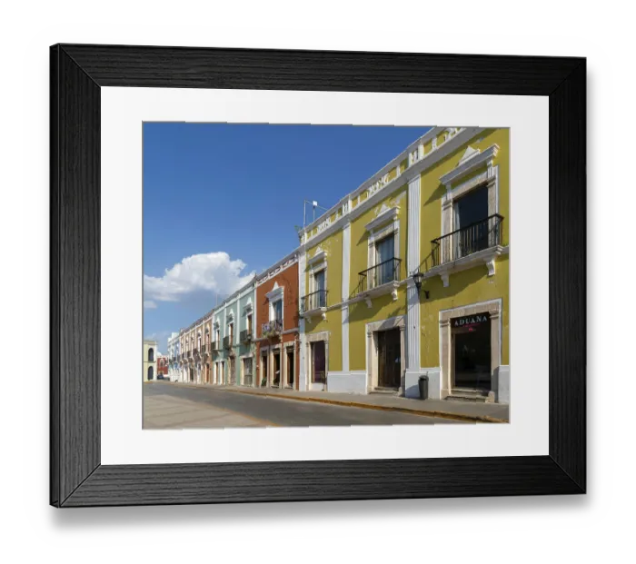 Framed Print : Marganzo restaurant in row of colourful Spanish colonial buildings