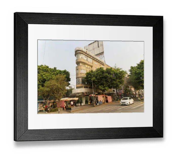 Framed Print : Narrow pointed building on corner of Avenue Insurgentes Sur