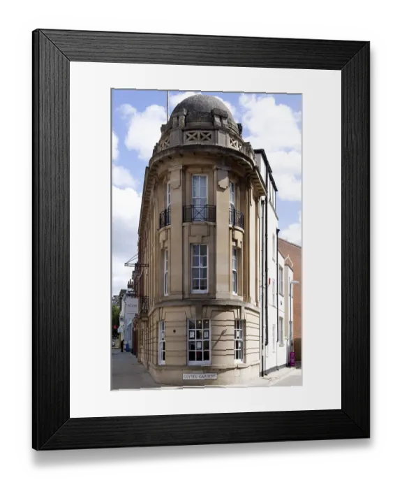 Framed Print : Narrow building on corner of Coytes Gardens in town centre of Ipswich