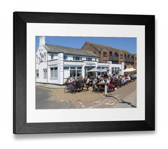 Framed Print : People sitting in sunshine outside the Jolly Sailors pub