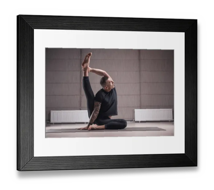 Framed Print : Adult man performs asana exercises