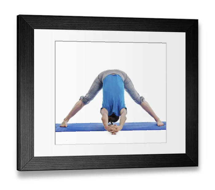 Framed Print : Yoga, young beautiful woman yoga instructor doing Wide Legged Forward Bend C pose (Prasarita Padottanasana C)