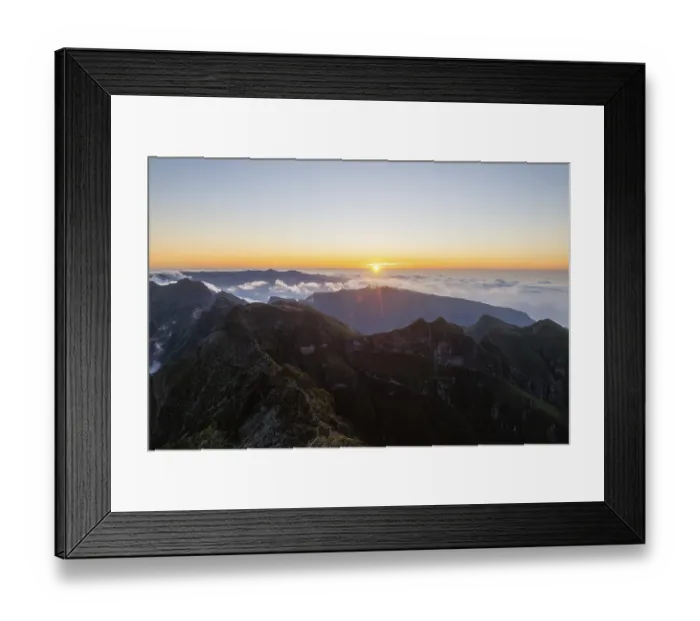 Framed Print : Aerial drone view of mountains over clouds near Pico Ruivo on sunset Framed Print : Aerial drone view of mountains over clouds near Pico Ruivo on sunset