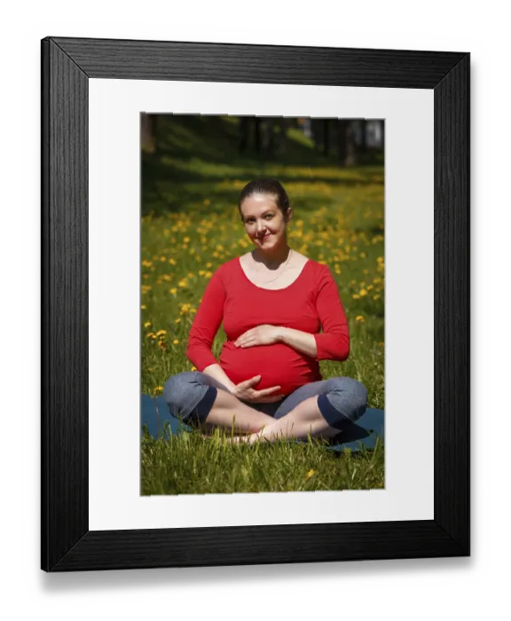Framed Print : Pregnancy yoga exercise