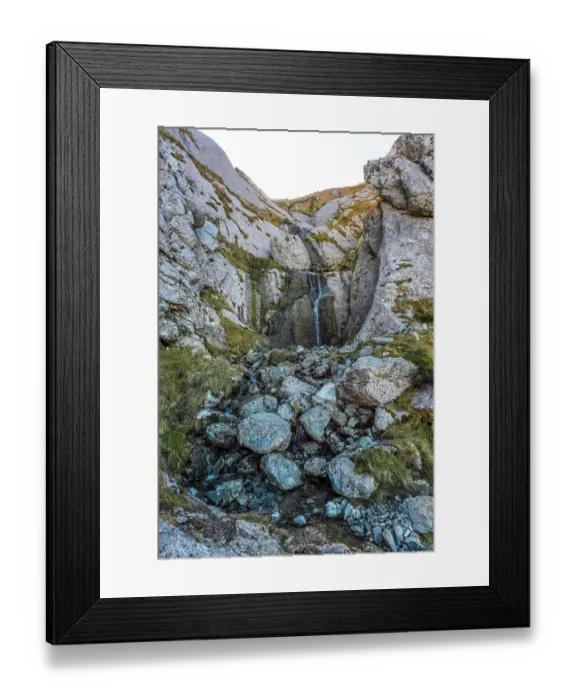 Framed Print : Stunning waterfall cascades down rugged rocks in mount txindoki