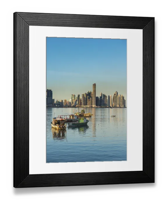 Framed Print : Little fishing boats before the skyline of Panama City
