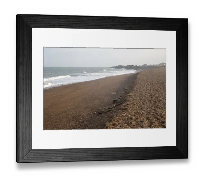 Framed Print : North Sea coastline shingle ridge on beach bar at East Lane
