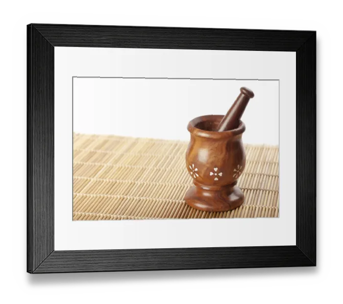 Framed Print : Wooden mortar with pestle on bamboo mat Framed Print : Wooden mortar with pestle on bamboo mat