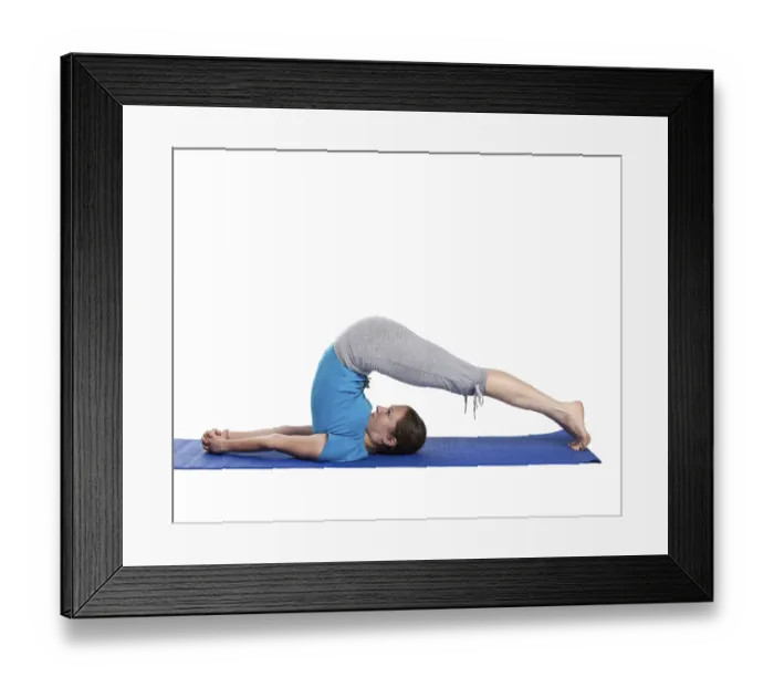 Framed Print : Yoga, young beautiful woman yoga instructor doing Plow pose asana (halasana) exercise isolated on white background