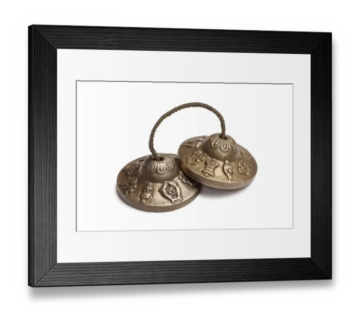 Framed Print : Tibetan Buddhist tingsha cymbals isolated on white