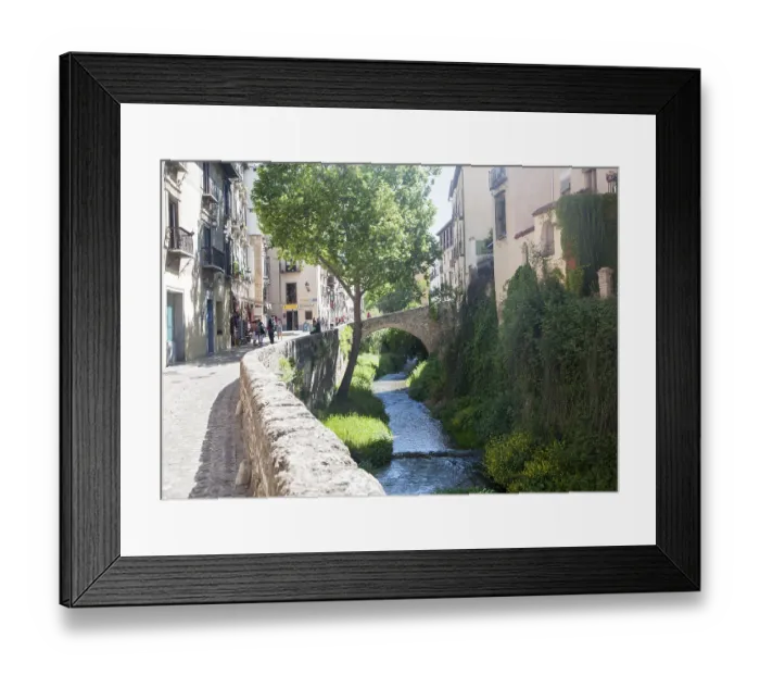 Framed Print : Historic buildings on Carrera del Darro and old bridge over the Rio Darro river Framed Print : Historic buildings on Carrera del Darro and old bridge over the Rio Darro river