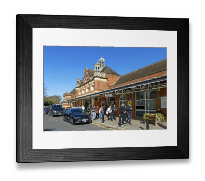 Framed Print : People and taxis outside Colchester North mainline railway station building