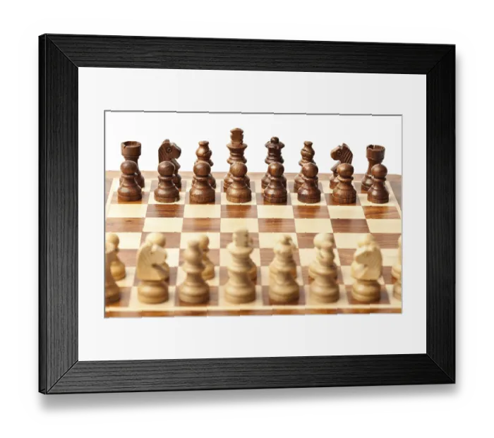 Framed Print : Wooden chess pieces on chessboard