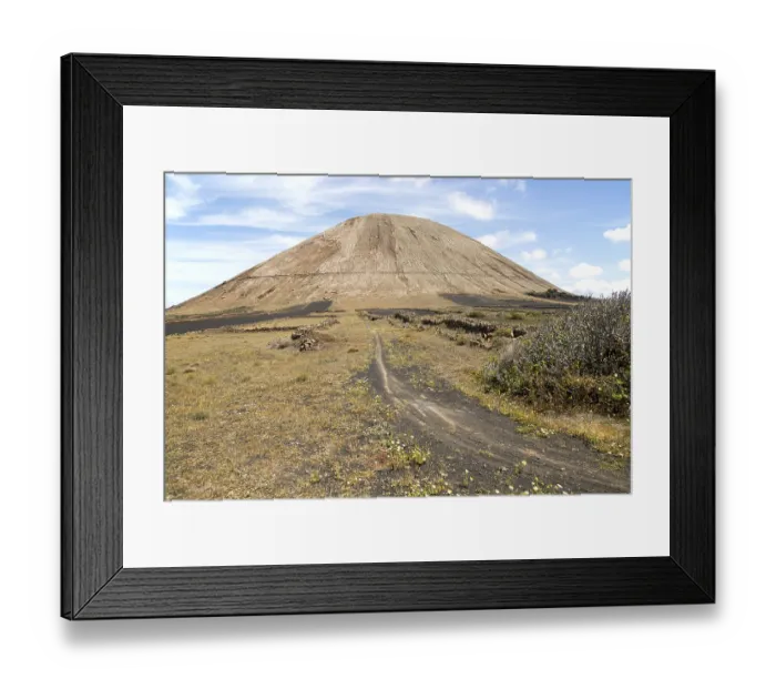 Framed Print : Volcano cone and black volcanic soil farmland