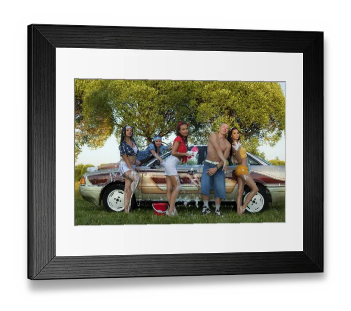 Framed Print : Cheerful female friends sitting on trunk of vintage car and looking at camera Framed Print : Cheerful female friends sitting on trunk of vintage car and looking at camera