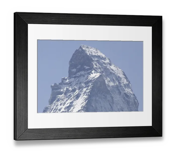 Framed Print : Top of a snow-capped mountain Matterhorn