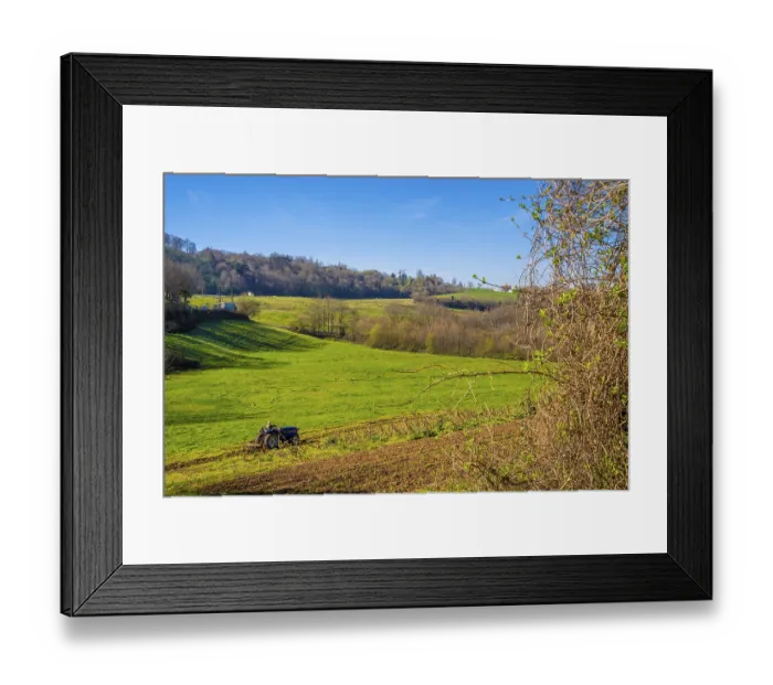 Framed Print : Tilling the land in the mountains of Errenteria with a tractor Framed Print : Tilling the land in the mountains of Errenteria with a tractor