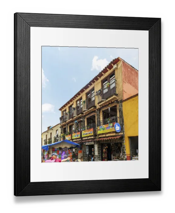 Framed Print : Historic buildings in town centre