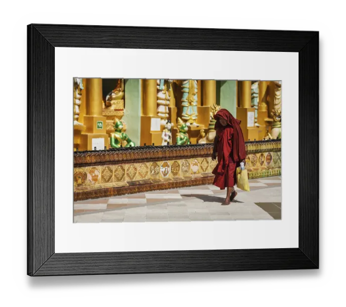 Framed Print : YANGON, MYANMAR, JANUARY 3, 2014: Old Buddhist monk walking in Shwedagon Paya pagoda