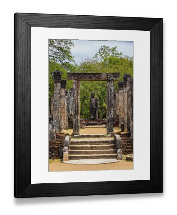 Framed Print : Standing Buddha statue in ancient ruins