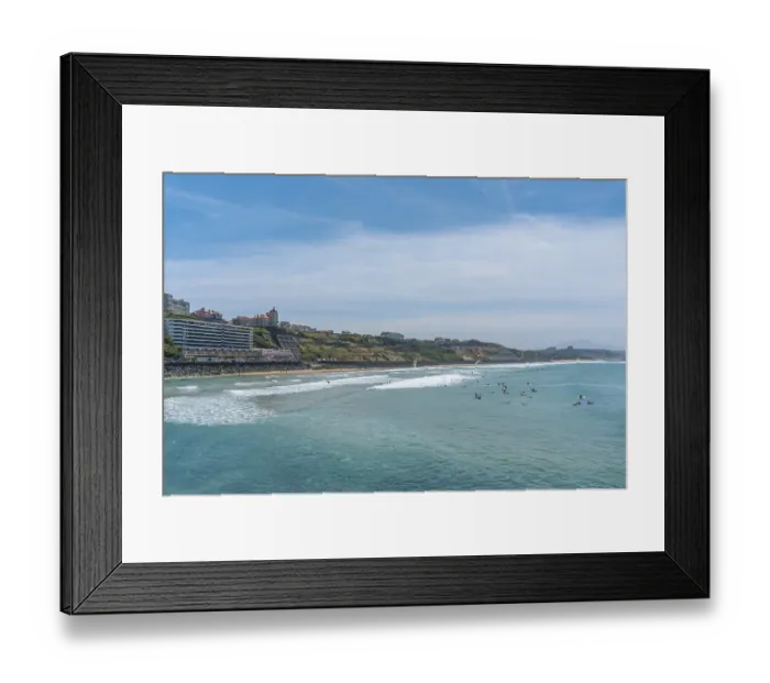Framed Print : Beach Cote des Basques on a summer afternoon full of surfers
