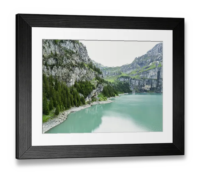 Framed Print : Calm lake encircled by cliffs and greenery with overcast skies Framed Print : Calm lake encircled by cliffs and greenery with overcast skies