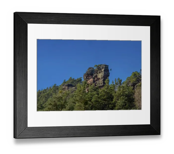 Framed Print : Burghalder rock overgrown with trees