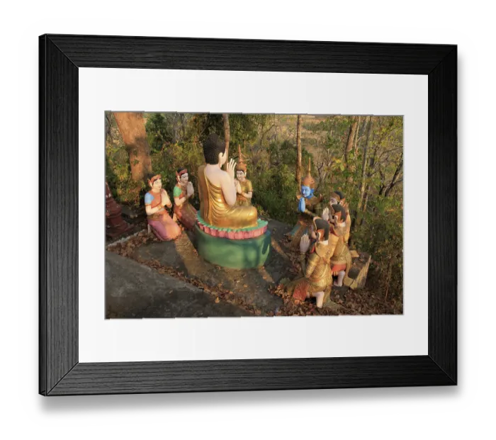 Framed Print : Buddha with a group of praying people in the Phnom Sambok Pagoda near Kratie in Cambodia