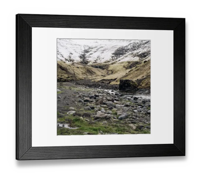 Framed Print : Shallow little mountain river, flows from snow-capped mountains into the gorge Framed Print : Shallow little mountain river, flows from snow-capped mountains into the gorge