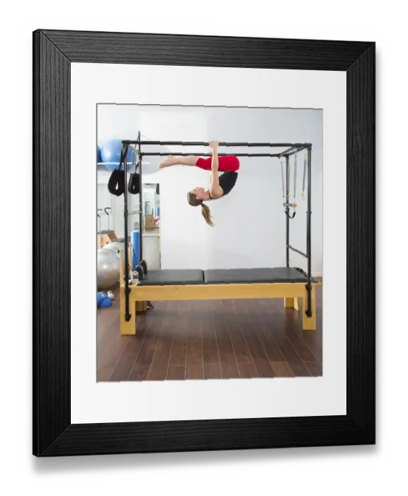 Framed Print : Aerobics pilates instructor woman in cadillac fitness exercise Framed Print : Aerobics pilates instructor woman in cadillac fitness exercise