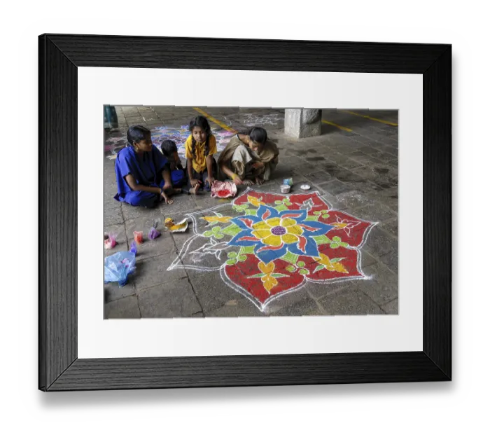 Framed Print : Drawing kolam, rangoli inside the temple floor