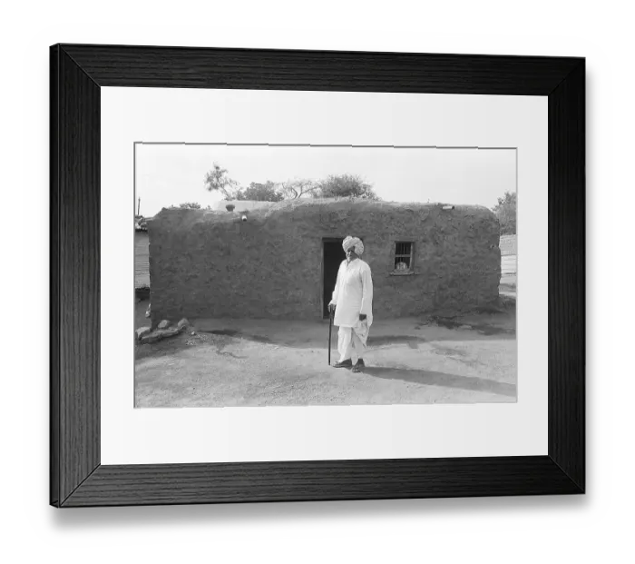 Framed Print : Rural man standing outside of his house Framed Print : Rural man standing outside of his house