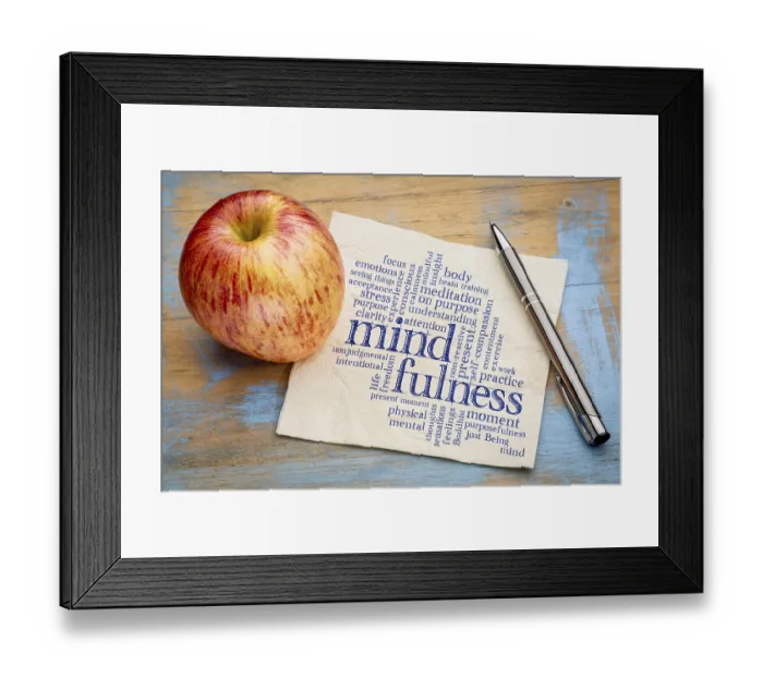 Framed Print : Mindfulness word cloud on a napkin with a fresh apple